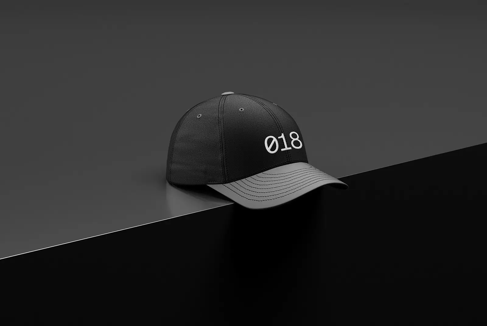 Studio shot of a black cap printed with 018